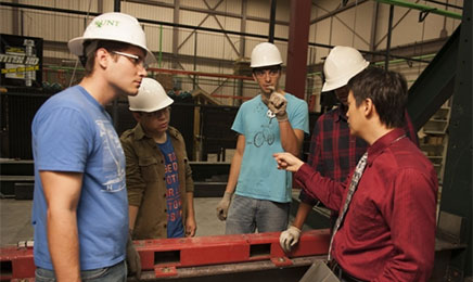 Students and professor in construction class